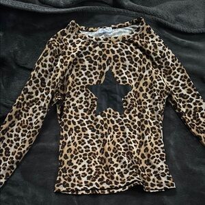 Leopard Print Woman Top with Black Star Worn Once.